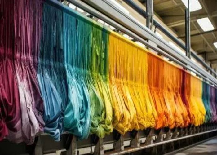 Fabric dyeing unit with colorful fabrics, tie-dye, reactive dyeing, pigment dyeing, distress dyeing, panel dyeing, and eco-friendly processes for uniform shade and durability